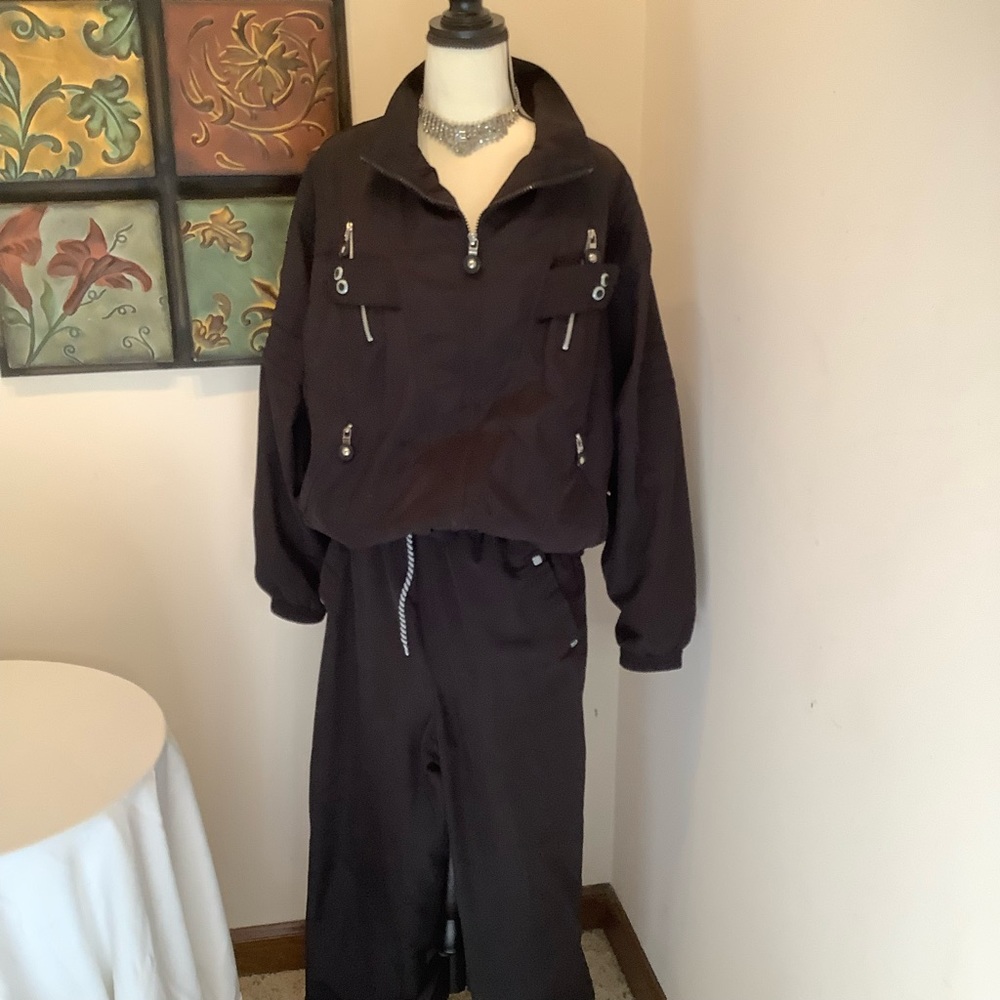 Jamie Sadock Black track wind suit. Size Large. Jacket and pants lined.